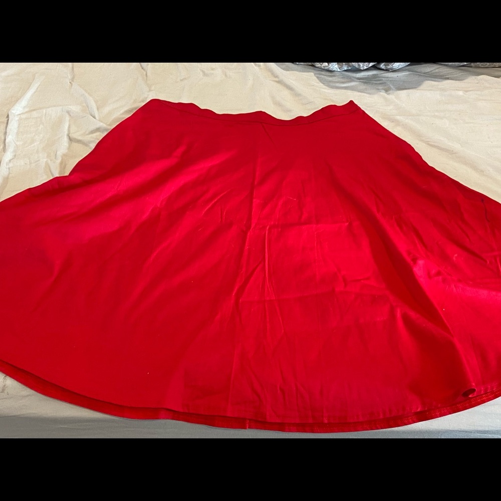 Red skirt. Coordinating shirt available but sold separately